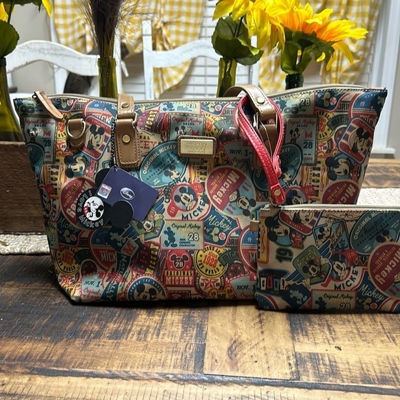 Disney Handbags - Disney Mickey Mouse tote bag with matching wristlet  nwt lots of room patch work